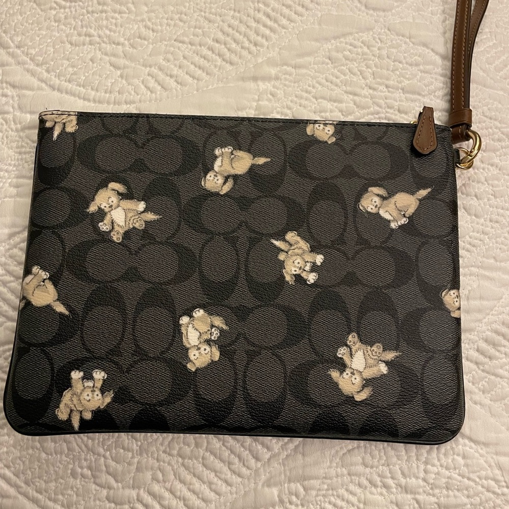 Coach pouch with dog prints